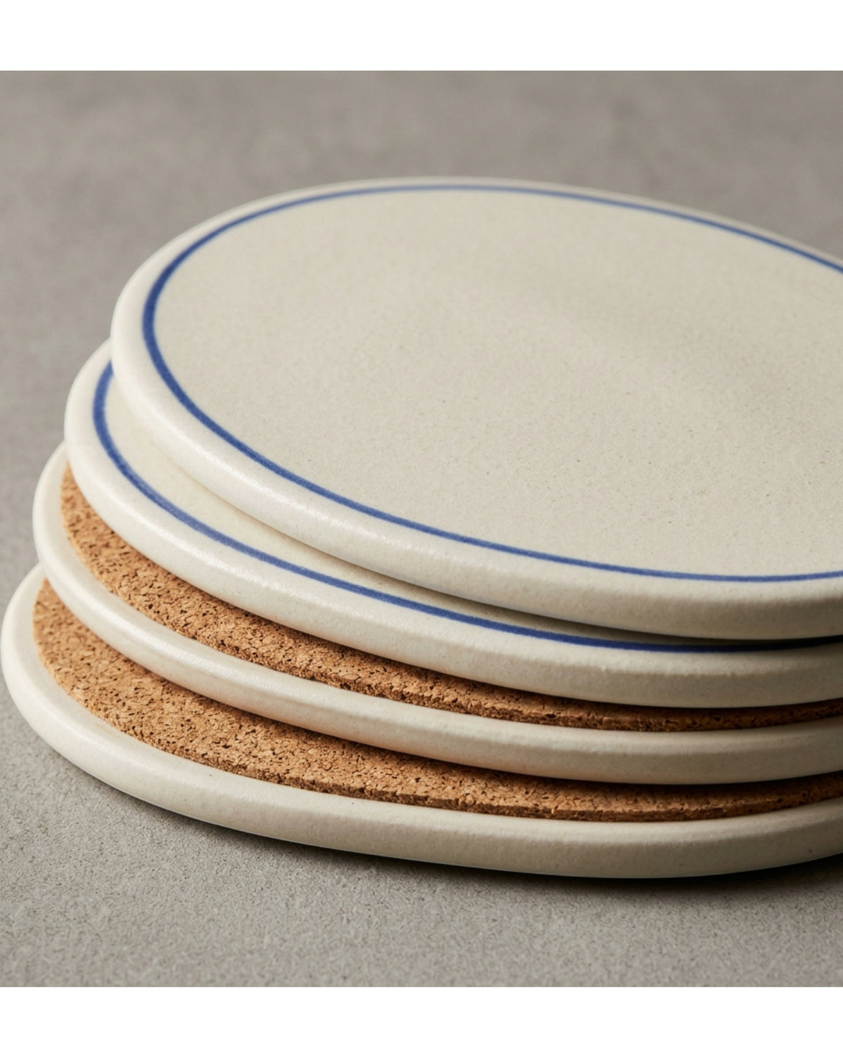 Zanet Oval Stoneware Coasters Set of 4 Ivory with Cobalt Line - Detail view