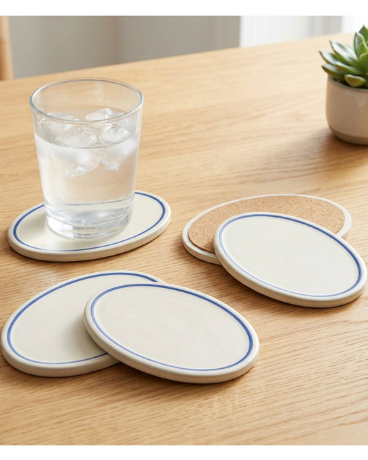 Zanet Oval Stoneware Coasters Set of 4 Ivory with Cobalt Line - Lifestyle view